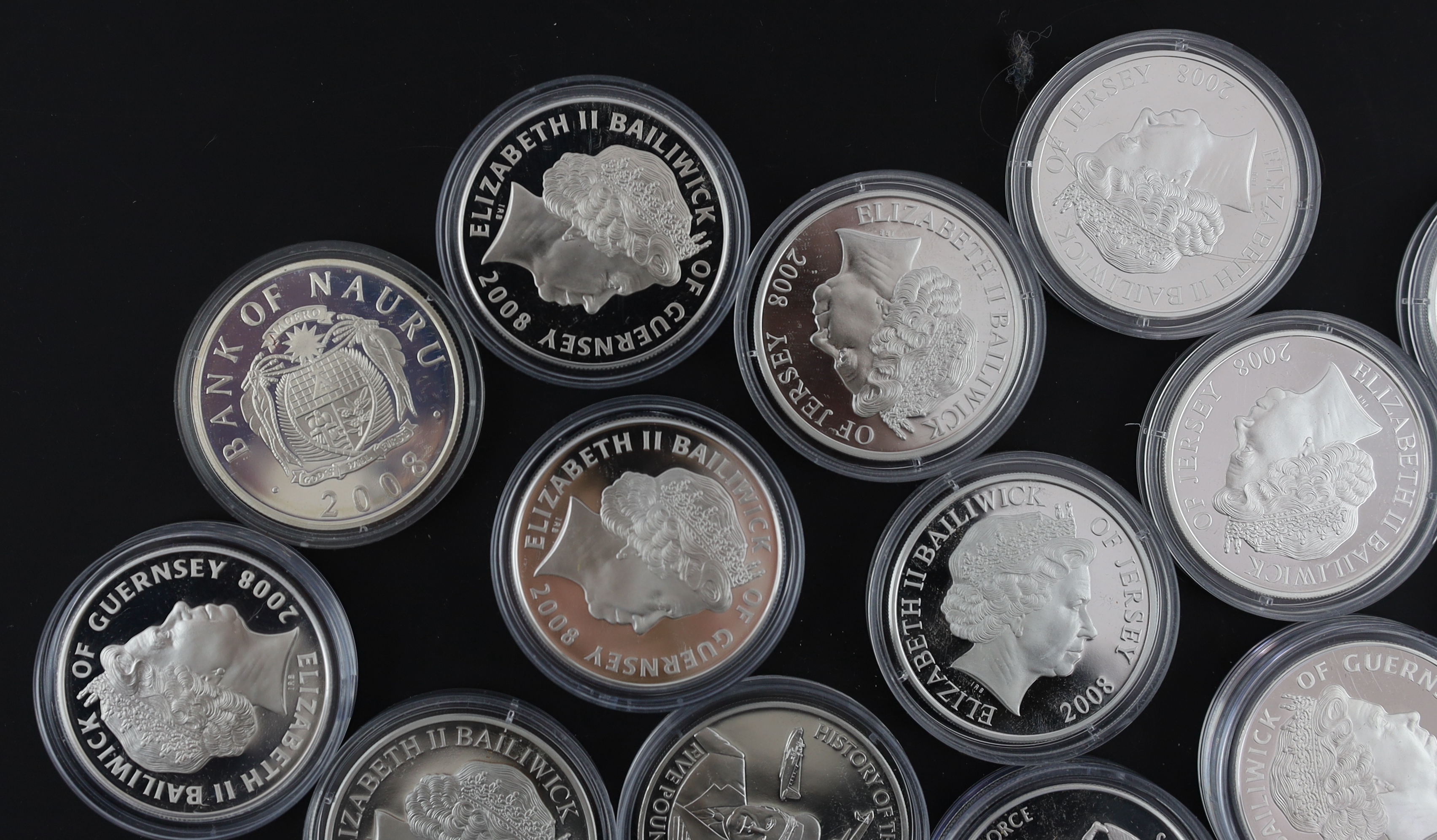 Bailiwick of Jersey and Guernsey coins, Elizabeth II, 13 History of the RAF proof silver £5 coins, 2008, a similar cupronickel coin and a Tristan da Cunha proof silver 80th anniversary Spitfire £1 coin (15)